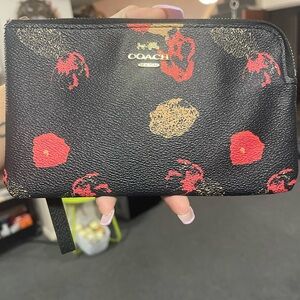 Coach Black Wristlet with Red and Gold Floral Accents